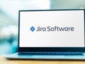 Laptop computer displaying logo of Jira